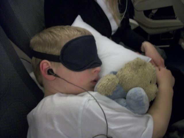 Tyler asleep on the plane